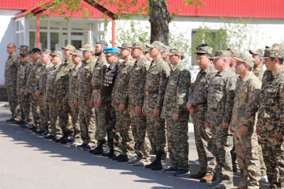 Торжественным построением отметили День защитника Отечества в Казкосмосе